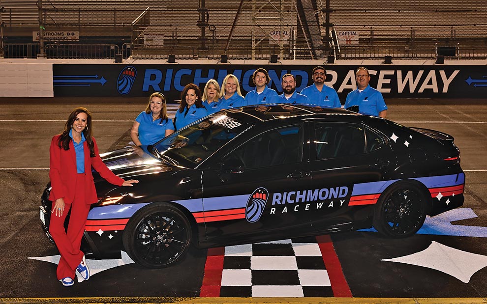 Lori Waran and some of her team with the NASCAR pace car