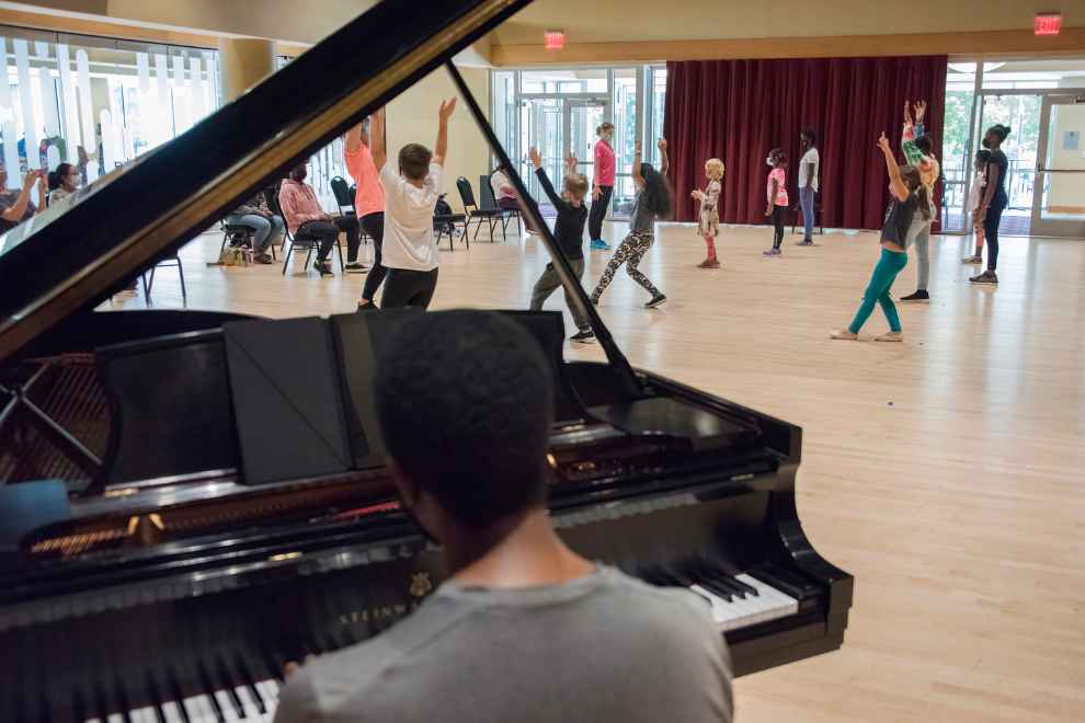 RPAA 2024 Lights Up! Grand Finale - pianist in studio with kids dancing