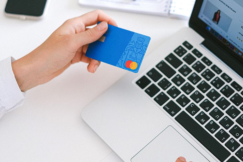 Shop Safe This Holiday Season credit card and laptop