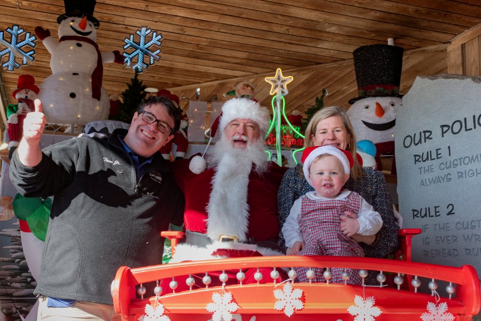 Happy Holidays from Tom Leonard’s TJ Leonard, President of Tom Leonard's Farmer's Market in Glen Allen, VA, with his family and Santa