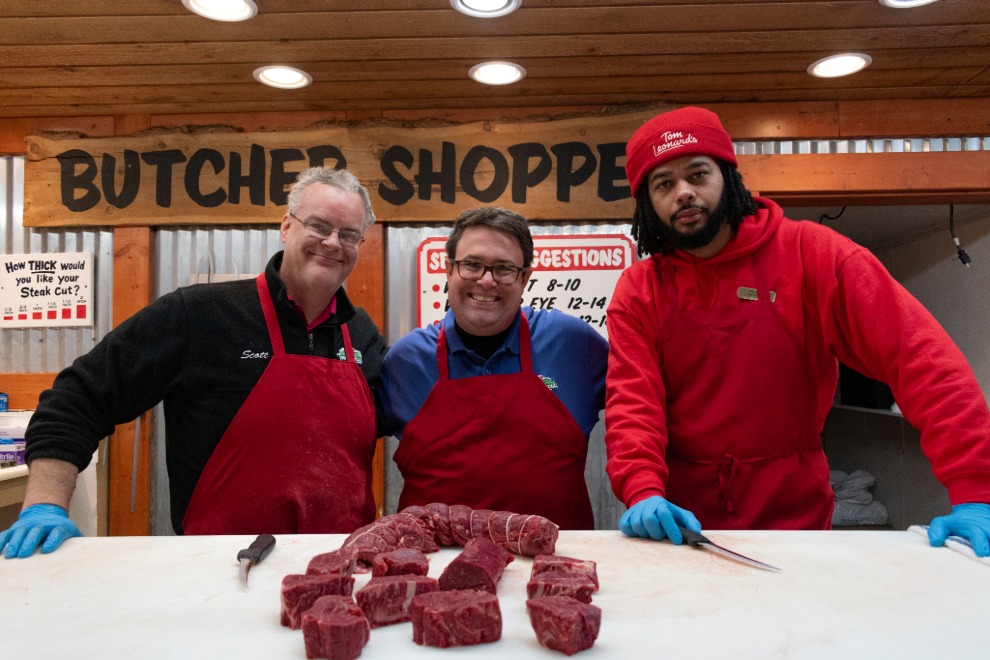 TJ Leonard, President of Tom Leonard's Farmer's Market in Glen Allen, VA, with the store's butchers