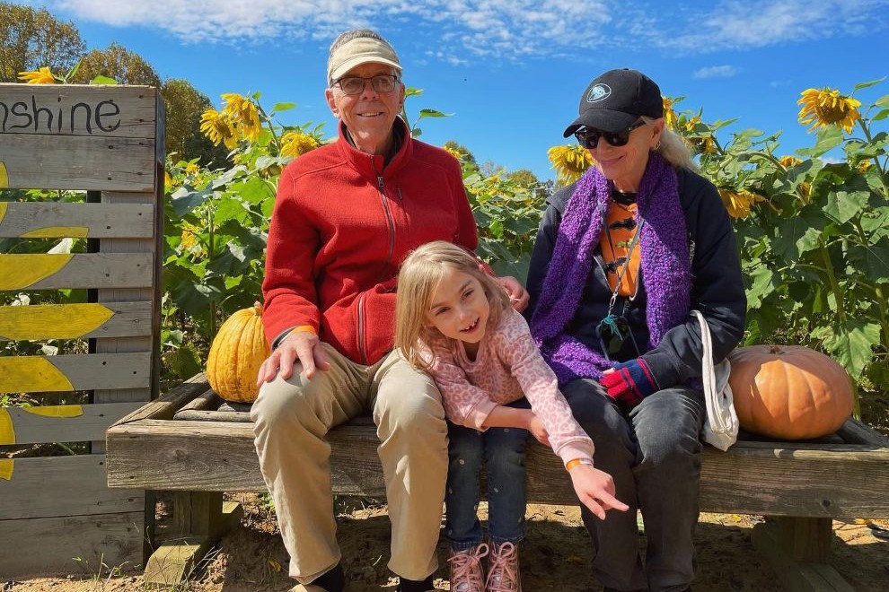 John Bryan with his wife and granddaughter