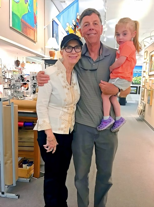 John Bryan with his wife and granddaughter