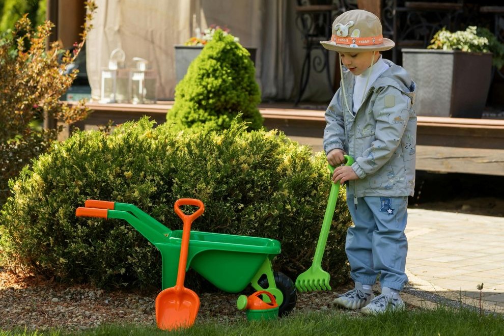 little boy playing outside