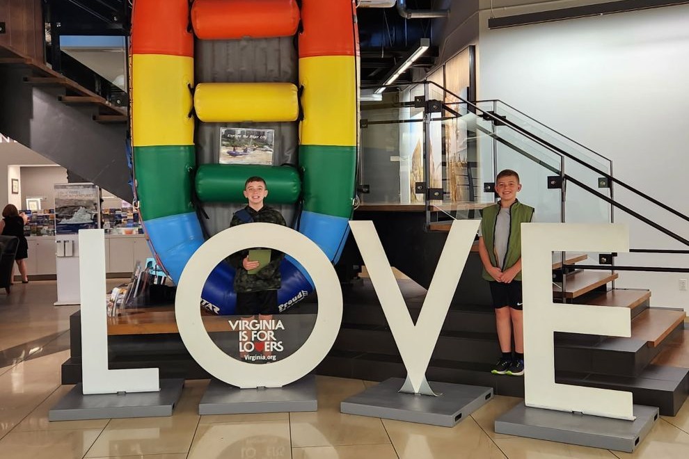 Two boys at the LOVE sign at Main Street Station Richmond VA