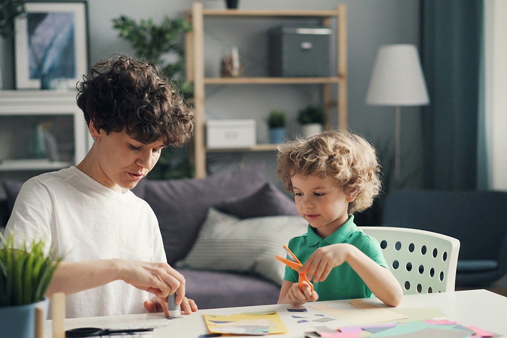 mother and child doing a craft together