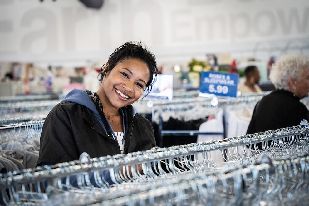 woman shopping at Goodwill - back to school savings