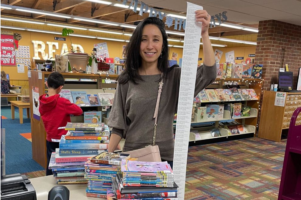 Richmond Public Library - patron with long checkout list in children's department