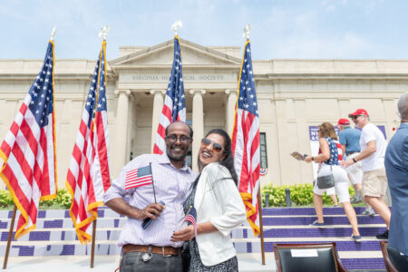 new Americans celebrate outside VMHC after 4th of July citizenship ceremony