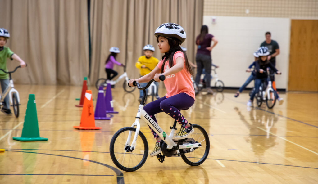 All Kids Bike is a program that helps kids learn how to ride bikes