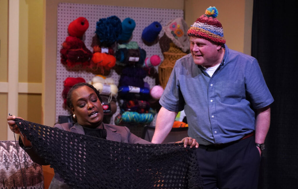 Two actors onstage for Cross Stitch Bandits