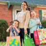 Mom and kids with reusable shopping bags
