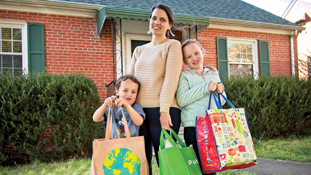 Mom and kids with reusable shopping bags