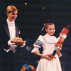 Maggie Small as Clara holds tight to her nutcracker.