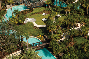 Visitors enjoy a conference center, spa, fitness center, and tennis courts, along with a 5-acre water park and playground, featuring the popular Kid for All Seasons program for children.