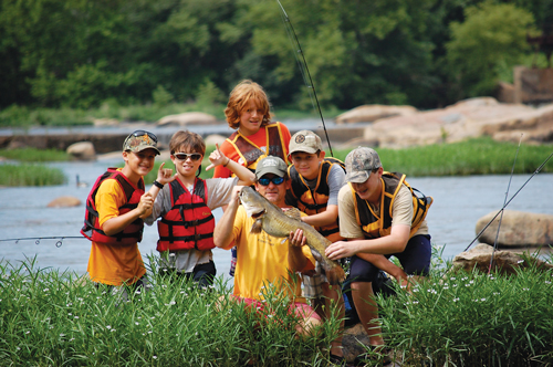 Tee Clarkson, founder of Richmond-based outdoor camp Virginia Outside, says, “A lot of families may not know exactly how to get their kids out fishing or mountain biking, so we like to create those opportunities.”