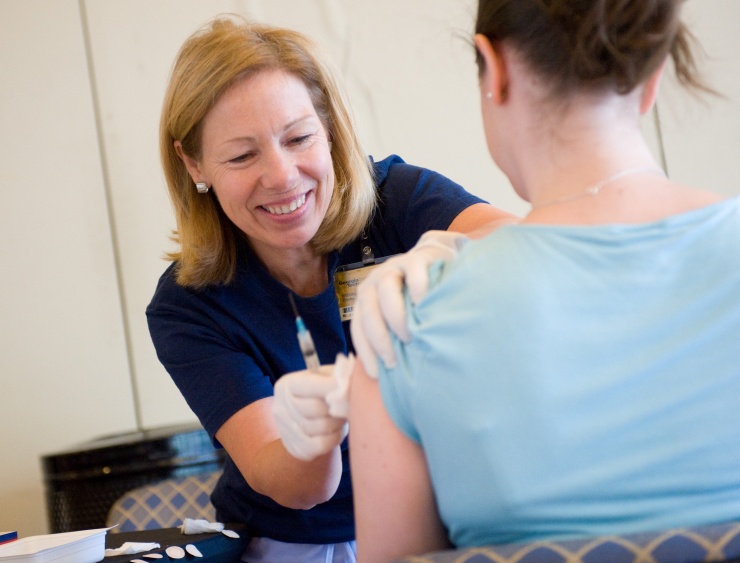 teen receiving a vaccine